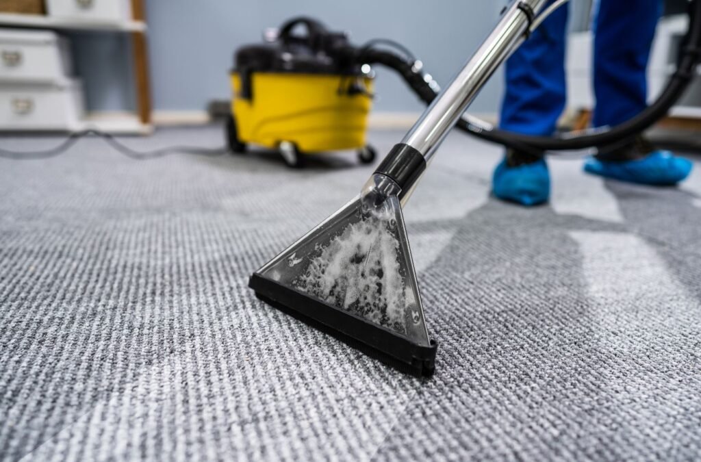 A MM Commercial Cleaning technician performing carpet cleaning in Tonawanda, NY to show the advantages of expert local cleaning services.